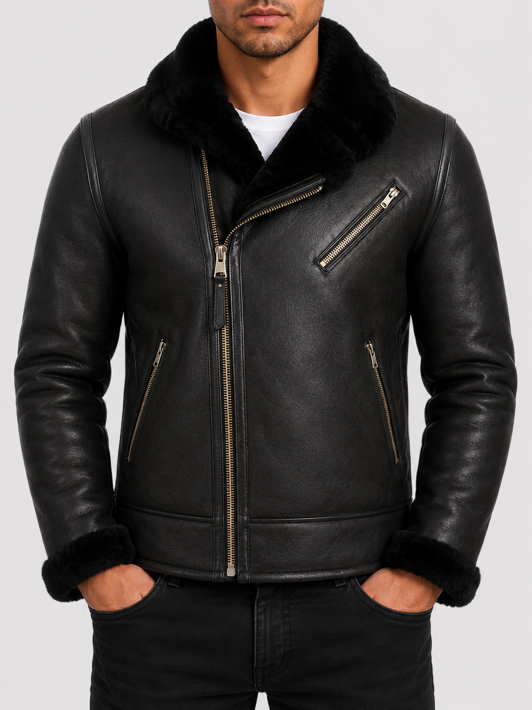Man wearing a black shearling leather jacket showing the warm shearling collar and lining